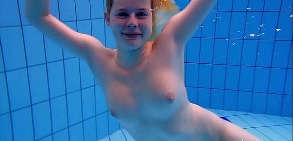  Big tits teen Lucie in the pool